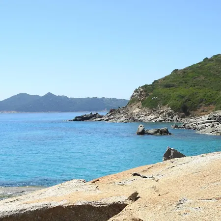 Eleonora, Sulle Bianche Spiagge Di Sant Elmo E Castiadas.
