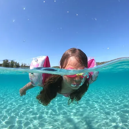 Eleonora, Sulle Bianche Spiagge Di Sant Elmo E Castiadas. *