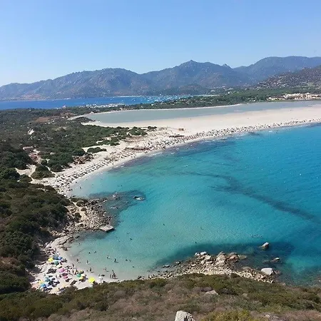 Eleonora, Sulle Bianche Spiagge Di Sant Elmo E Castiadas.